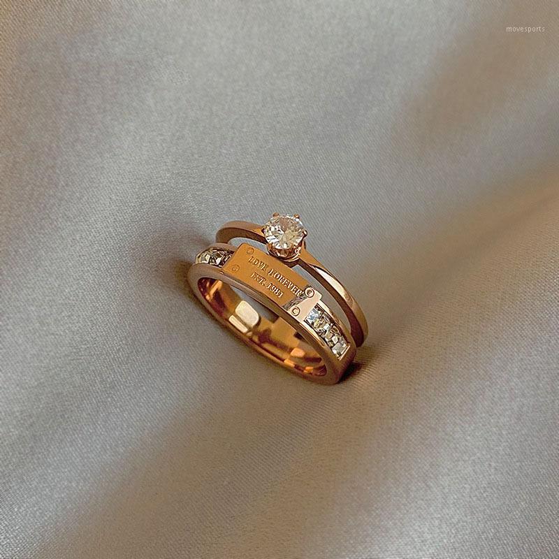 Wedding Rings 2021 Classic Titanium Steel Rose Gold Double Letter For Woman Fashion Finger Jewelry Party Girl's Temperament Ring1
Wedding Rings 2021 Classic Titanium Steel Rose Gold Double Letter For Woman Fashion Finger Jewelry Party Girl's Temperament Ring1