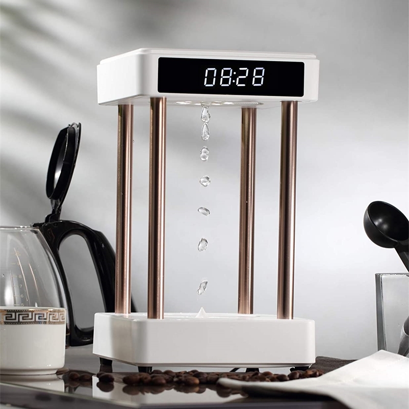Creative Gift Anti Gravity Floating Levitating Water Drops Time Lamp for Desk Decoration Birthday Home Decor 210727
Creative Gift Anti Gravity Floating Levitating Water Drops Time Lamp for Desk Decoration Birthday Home Decor 210727