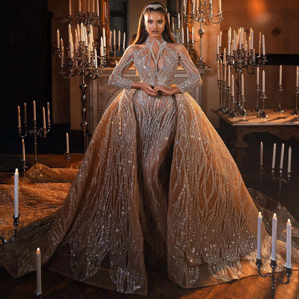 Luxurious Dubai Mermaid Wedding Dresses Long Sleeves Sequins Detachable Train Bridal Gown Custom Made Beads Court Train Robes De Mariée, White
Luxurious Dubai Mermaid Wedding Dresses Long Sleeves Sequins Detachable Train Bridal Gown Custom Made Beads Court Train Robes De Mariée, White