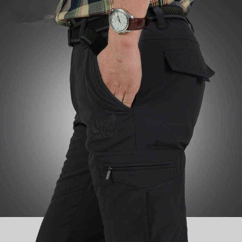 Men Winter Thick Warm Cargo Pants Casual Fleece Pockets Long Trousers Fashion Loose Baggy Jogeer Worker Male Pants 4XL 211112