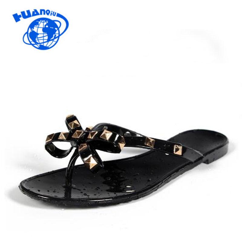 Slippers HUANQIU Women Rivets Bowknot Flat Girls Flip Flops Summer Shoes Cool Beach Jelly Drop WFQ72, Black
Slippers HUANQIU Women Rivets Bowknot Flat Girls Flip Flops Summer Shoes Cool Beach Jelly Drop WFQ72, Black