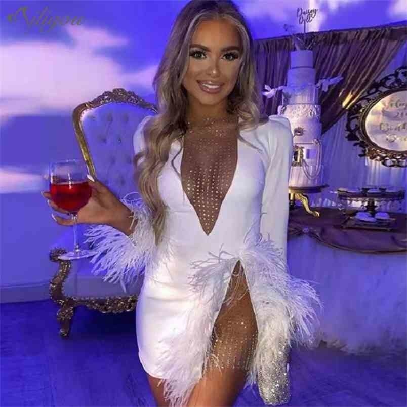 Sexy V-Neck Sequin Feather Patchwork Long Sleeve Bodycon Celebrity Party Dress See Through Mini Bandage Vestidos 210525, White
Sexy V-Neck Sequin Feather Patchwork Long Sleeve Bodycon Celebrity Party Dress See Through Mini Bandage Vestidos 210525, White