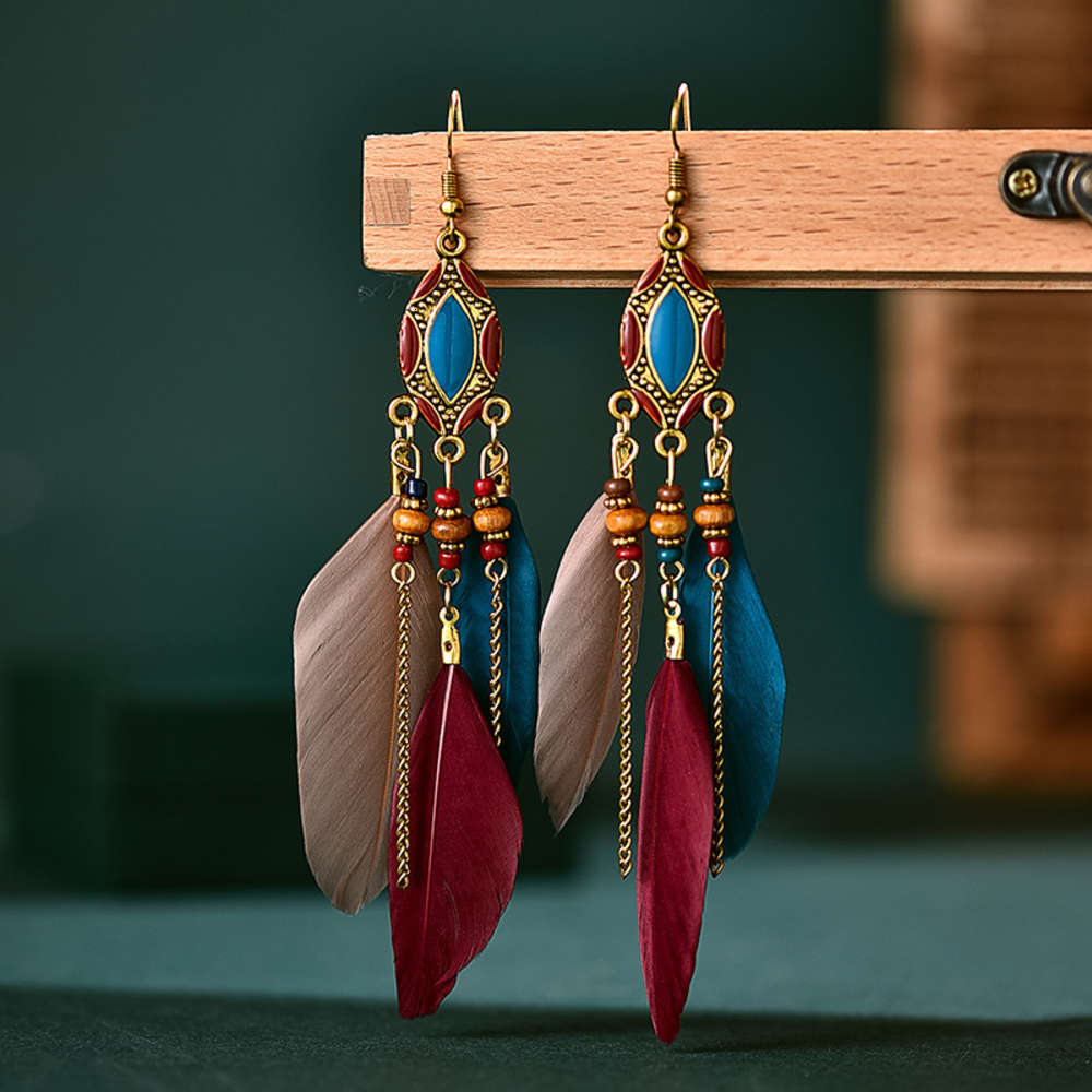 earrings Daisy's creative tassel Feather women's long oil dripping Earrings Bohemian jewelry, Golden
earrings Daisy's creative tassel Feather women's long oil dripping Earrings Bohemian jewelry, Golden
