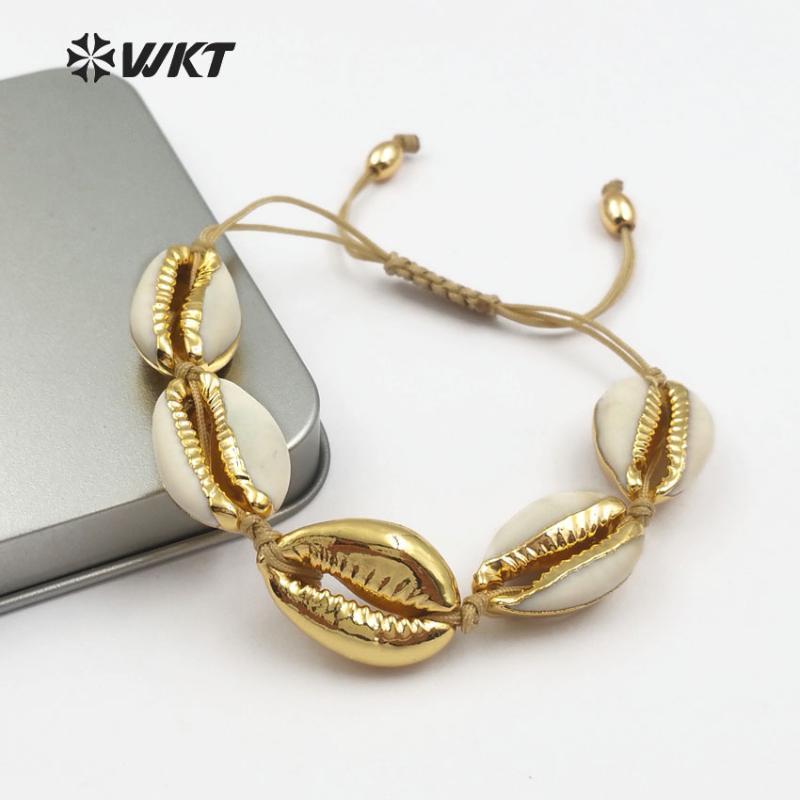 Bangle WT-B433 WKT Wholesale 5pcs Sea Side Jewelry White Cowrie Shell Bracelet With One Full Metallic In Boho Style1
Bangle WT-B433 WKT Wholesale 5pcs Sea Side Jewelry White Cowrie Shell Bracelet With One Full Metallic In Boho Style1