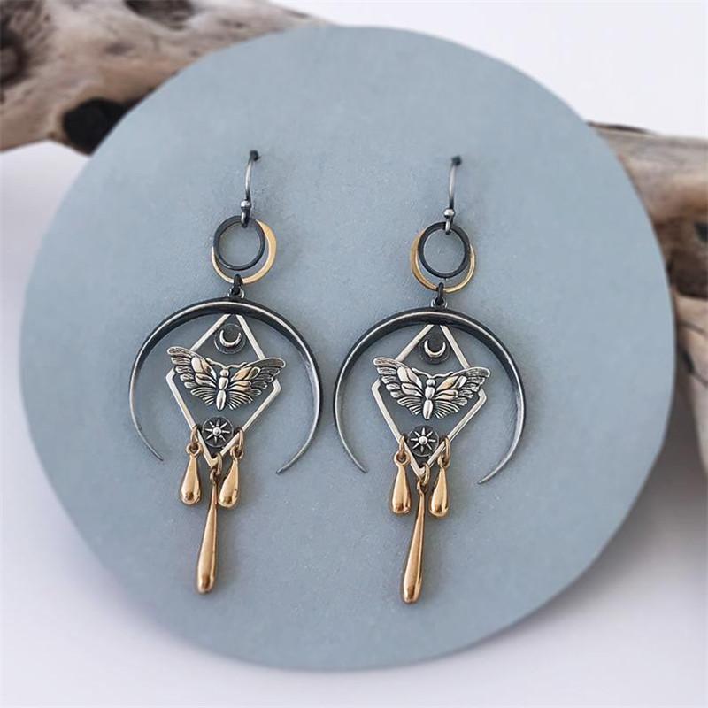 Dangle & Chandelier Gothic Evil Eye Flying Moth Drop Earrings For Women Steampunk Jewelry Hollow Round Metal Butterfly Earring, Silver
Dangle & Chandelier Gothic Evil Eye Flying Moth Drop Earrings For Women Steampunk Jewelry Hollow Round Metal Butterfly Earring, Silver