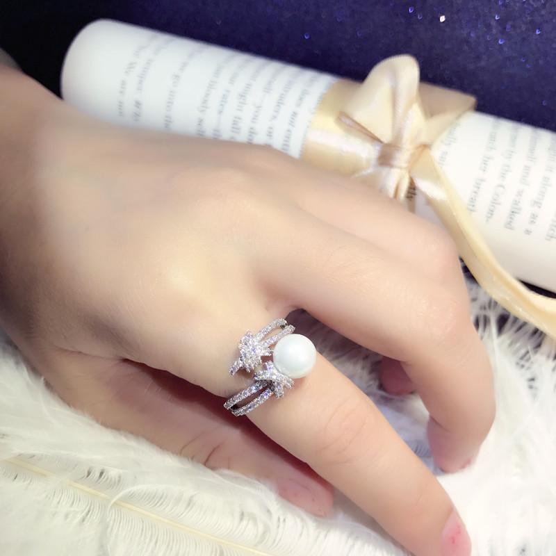 Cluster Rings Open Imitation Pearl For Women Temperament Rope Knot Zircon White Gold Color Wedding Jewelry Wholesale KAR125, Golden;silver
Cluster Rings Open Imitation Pearl For Women Temperament Rope Knot Zircon White Gold Color Wedding Jewelry Wholesale KAR125, Golden;silver