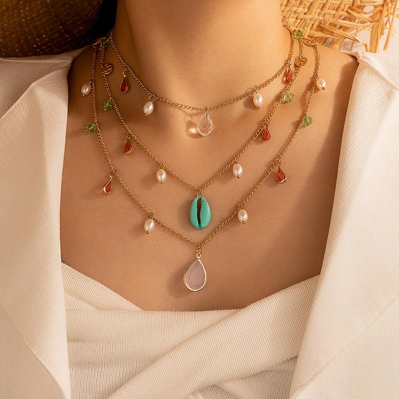Pendant Necklaces HuaTang Boho Colorful Crystal Pearl Necklace For Women Multilayer Water Drop Shell Charming Ladies Jewelry On The Neck
Pendant Necklaces HuaTang Boho Colorful Crystal Pearl Necklace For Women Multilayer Water Drop Shell Charming Ladies Jewelry On The Neck