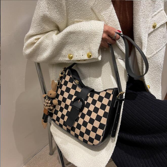 Wholesale personality check shoulder bags European and American popular checkerboard pattern women handbag sweet and lovely cartoon pendant fashion bucket bag, Brown2(boutique box)
Wholesale personality check shoulder bags European and American popular checkerboard pattern women handbag sweet and lovely cartoon pendant fashion bucket bag, Brown2(boutique box)