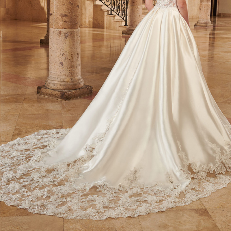 Elegant Backless Wedding Dress Bridal Gowns with Pockets Scoop Sleevess Satin Sheer with Floral Applique Beads Sequins