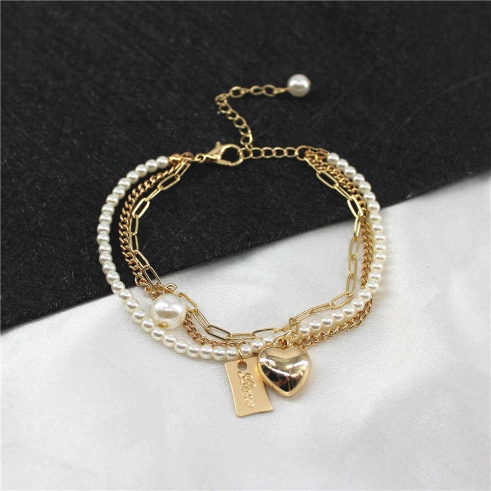 Imitation pearl white love three layer Bracelet women's indifference design student net red French, Golden;silver
Imitation pearl white love three layer Bracelet women's indifference design student net red French, Golden;silver