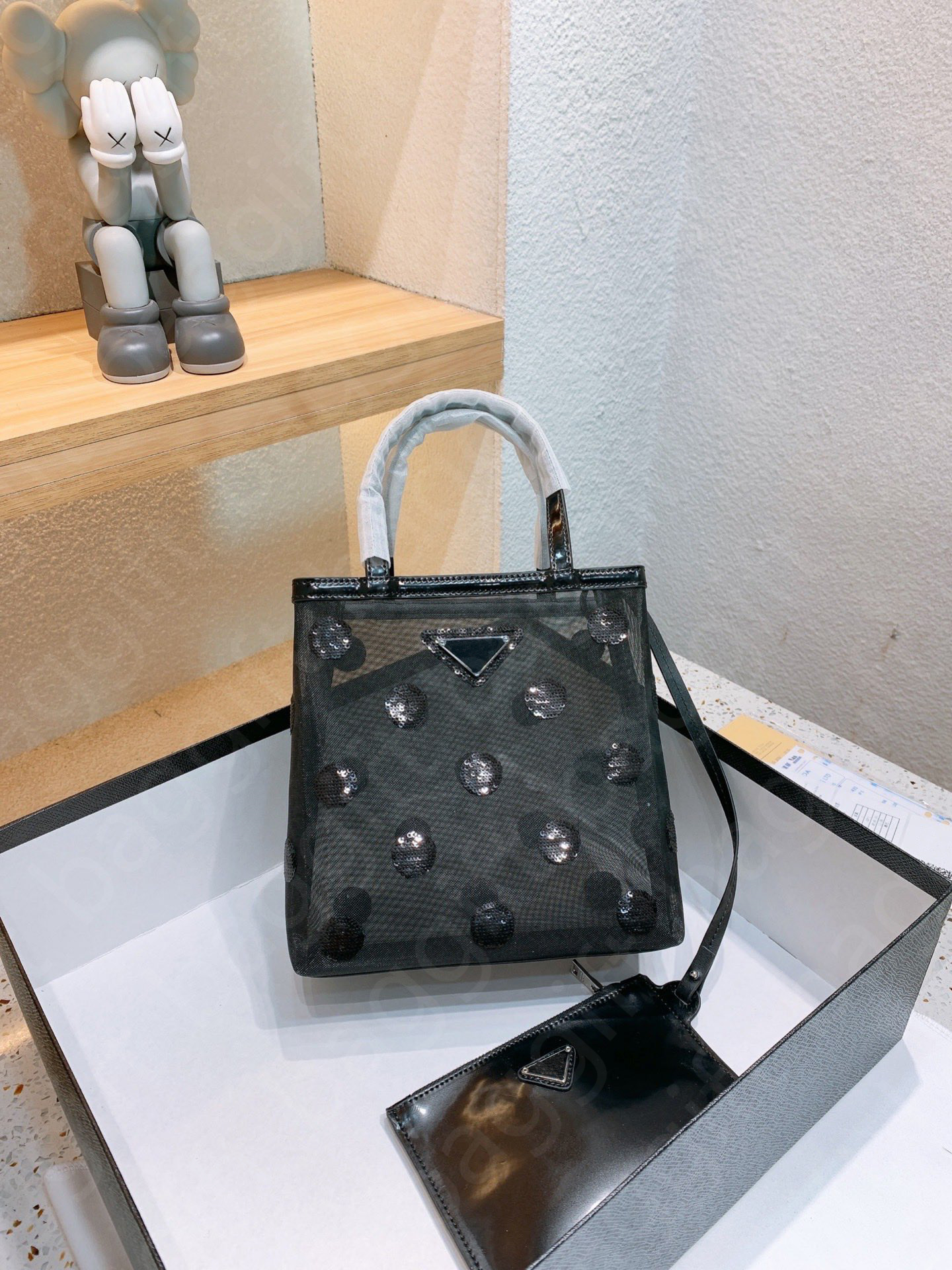 Polka-dot mesh tote bag Black Embroidered sequin polka dot motif handbag Leather zipper pouch Purse Wallets Enameled metal triangle logo Cross body Nylon pocket, Customize
Polka-dot mesh tote bag Black Embroidered sequin polka dot motif handbag Leather zipper pouch Purse Wallets Enameled metal triangle logo Cross body Nylon pocket, Customize
