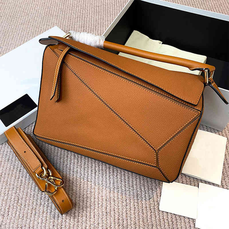 Puzzle geometry bag lychee grain small cow leather versatile One Shoulder Messenger Bag Fashion high-grade handbag
Puzzle geometry bag lychee grain small cow leather versatile One Shoulder Messenger Bag Fashion high-grade handbag