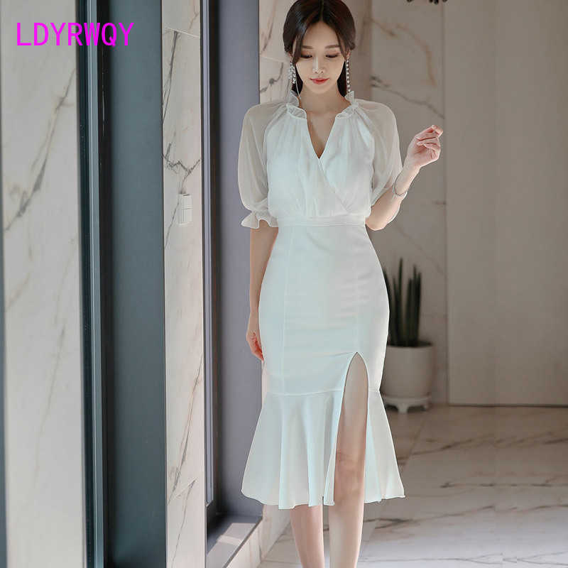 Summer Korean version of the temperament V-neck Slim split ruffle bag hip dress female Cotton Office Lady 210603, White
Summer Korean version of the temperament V-neck Slim split ruffle bag hip dress female Cotton Office Lady 210603, White