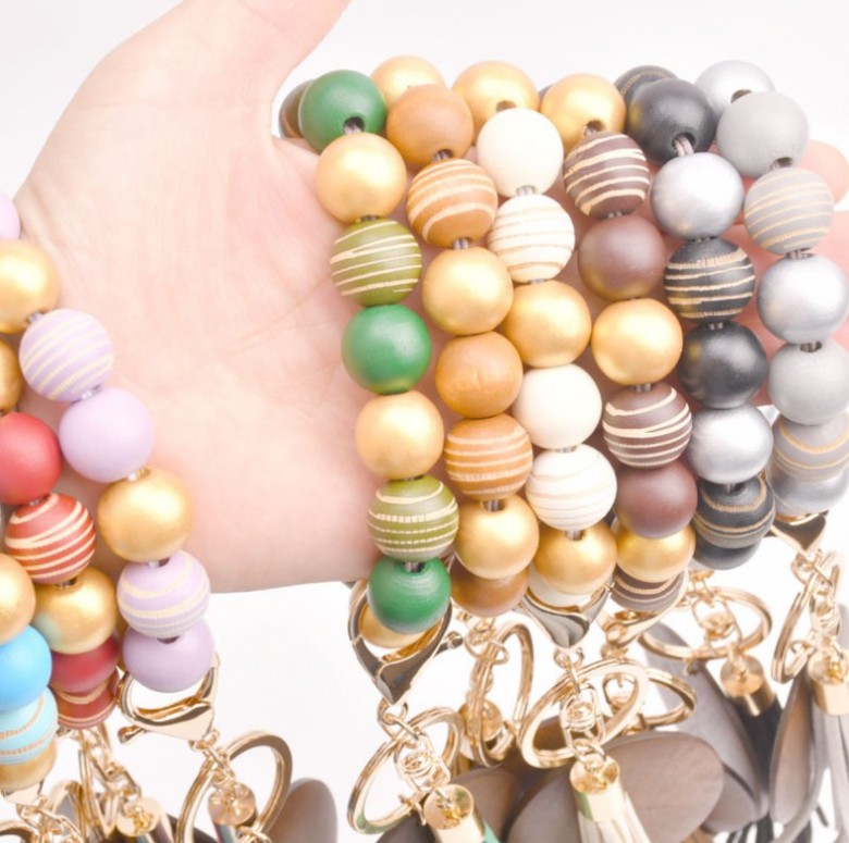 Foreign trade beaded wood bead bracelet keychain blank disc tassel key ring pendant pure multicolor optional
Foreign trade beaded wood bead bracelet keychain blank disc tassel key ring pendant pure multicolor optional