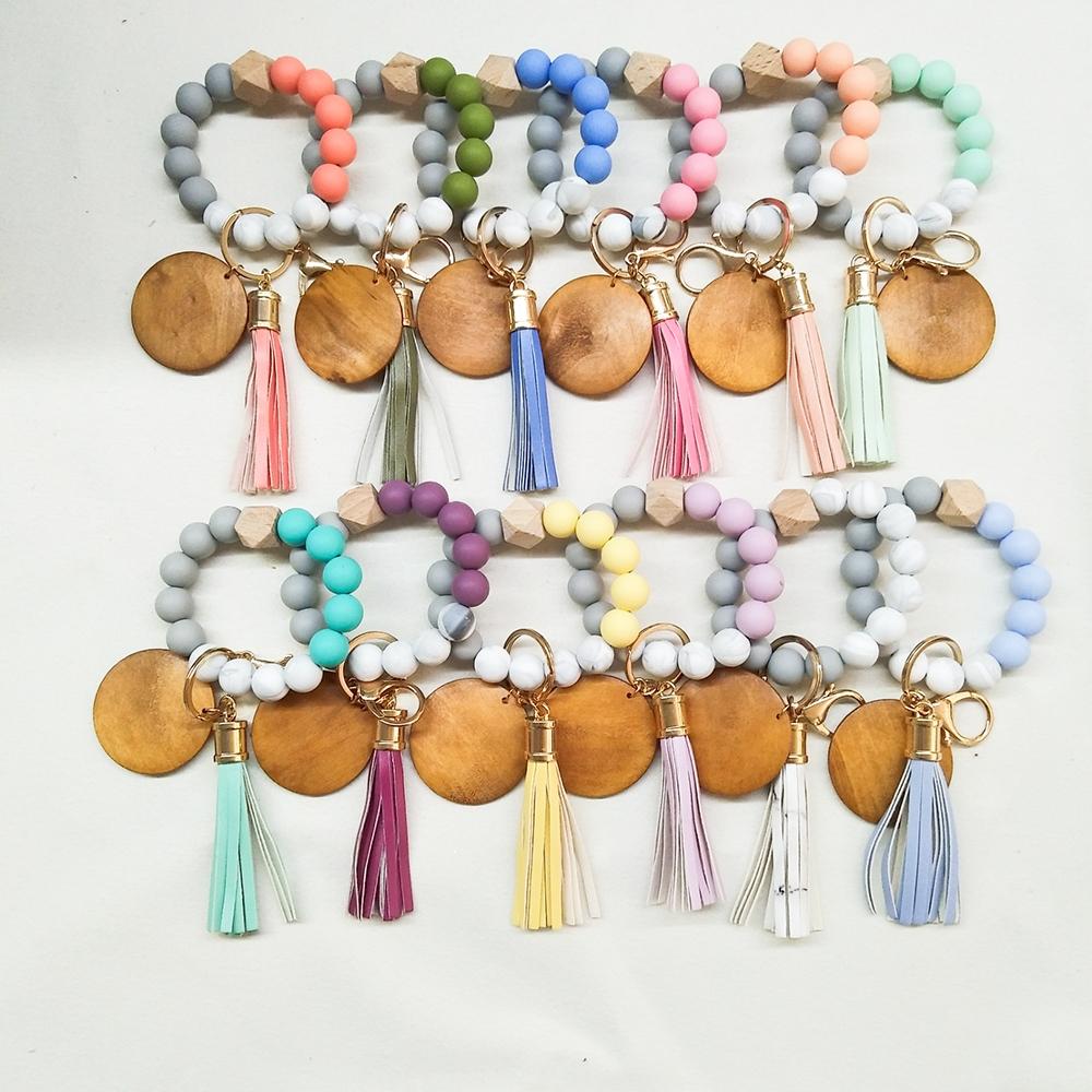 Foreign trade food grade silicone beads wrist keychain PU leather tassel key ring female multi-color optional