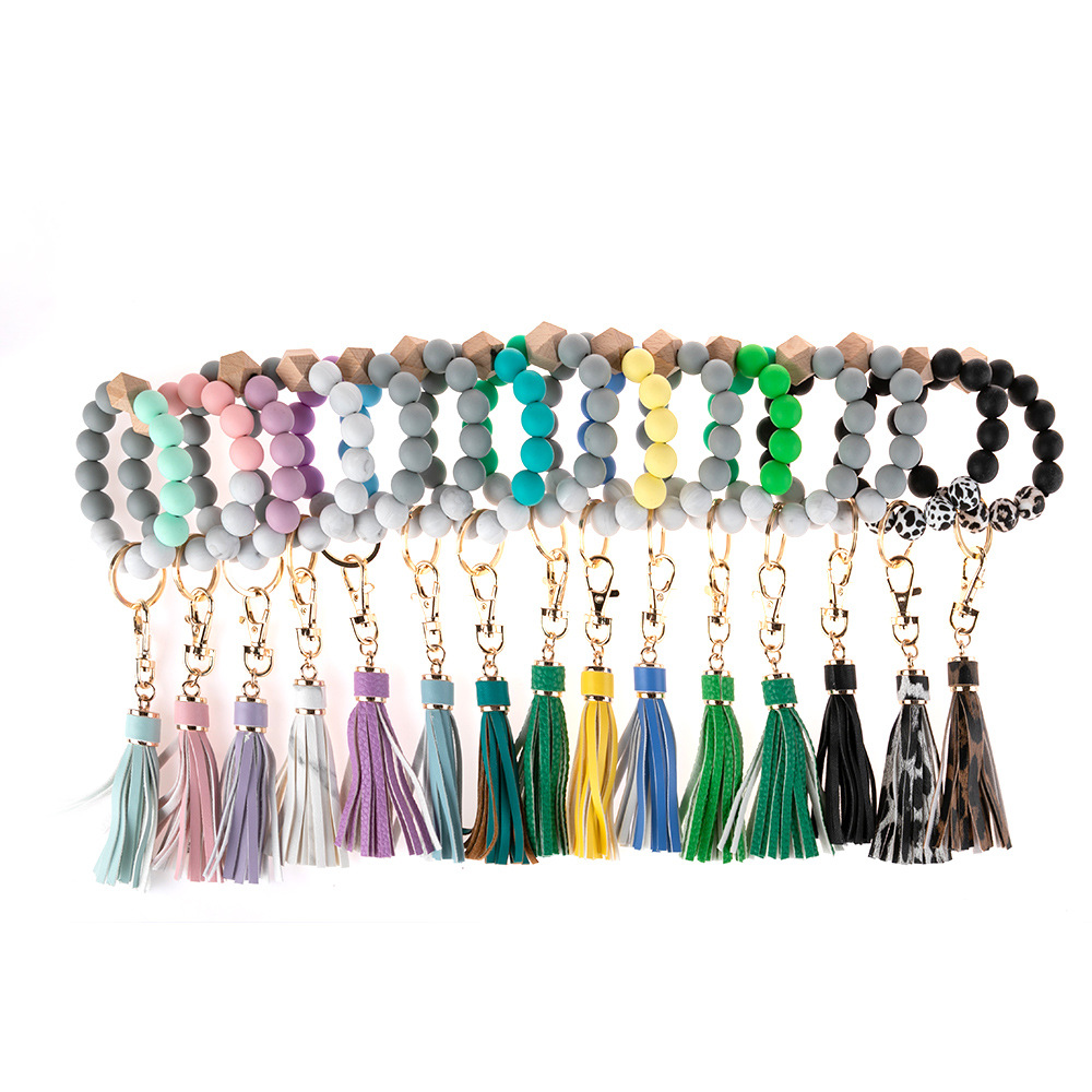 Kimter Wooden Beads Wristlet Key Ring Solid Color Stretchy Silicone Bracelet Keychain with Tassel for Lady Bag Pendant Q385FZ
Kimter Wooden Beads Wristlet Key Ring Solid Color Stretchy Silicone Bracelet Keychain with Tassel for Lady Bag Pendant Q385FZ