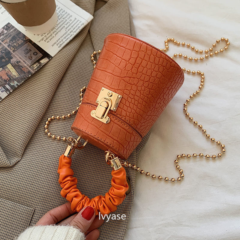 Orange Small bucket bag golden bead chain Sdvanced Summer Zipper Young People Pure Color Mini One Shoulder Cross-bodybag
Orange Small bucket bag golden bead chain Sdvanced Summer Zipper Young People Pure Color Mini One Shoulder Cross-bodybag
