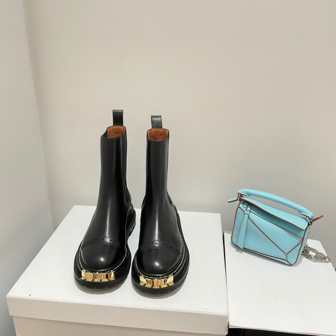 Metal big gold teeth thick bottom short boots female Martin boots leather sleeve flat bottom rivet single boots, Black
Metal big gold teeth thick bottom short boots female Martin boots leather sleeve flat bottom rivet single boots, Black