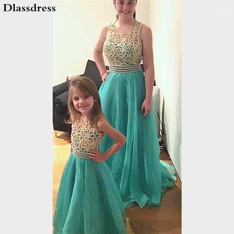 Green Flower Girl Dress Beading Top Mother And Daughter Dresses Sleeveless Floor Length O-neck Prom Celebrity Dresses1
Green Flower Girl Dress Beading Top Mother And Daughter Dresses Sleeveless Floor Length O-neck Prom Celebrity Dresses1