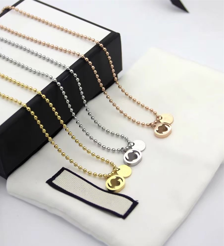 Fashion Style Lady Titanium steel 18K Gold Round Beads Chain Necklaces With Hollow Out Engrave Double Letter Pendants, Silver
Fashion Style Lady Titanium steel 18K Gold Round Beads Chain Necklaces With Hollow Out Engrave Double Letter Pendants, Silver