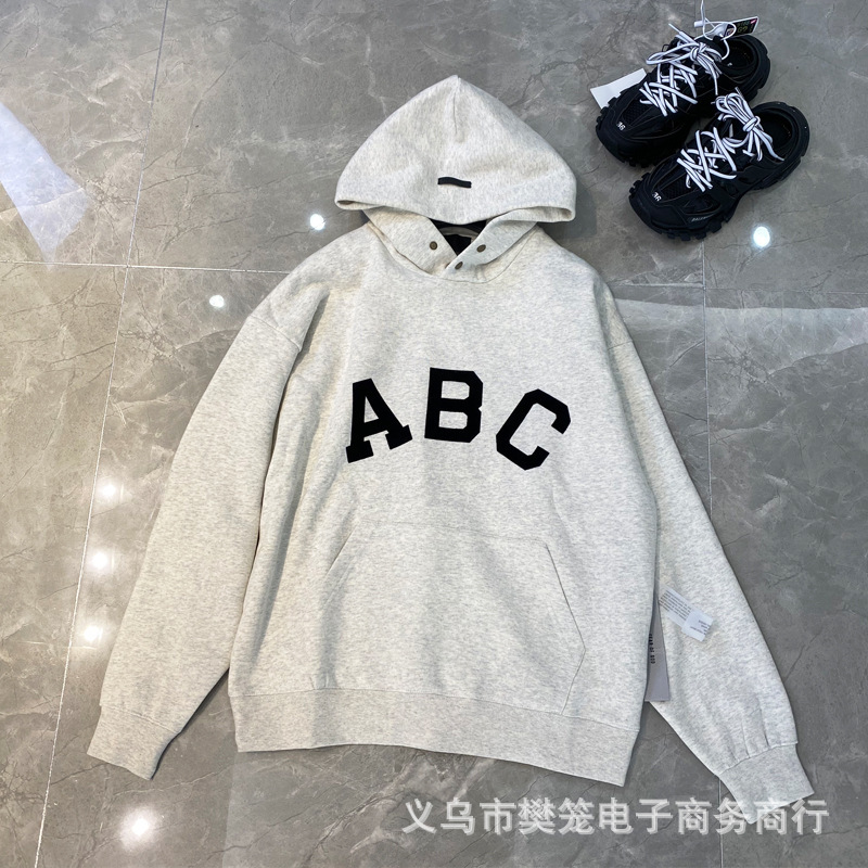 Fear of God essentials Season 7 button flocking letters men's and women's Hoodie high street fog, Black
Fear of God essentials Season 7 button flocking letters men's and women's Hoodie high street fog, Black