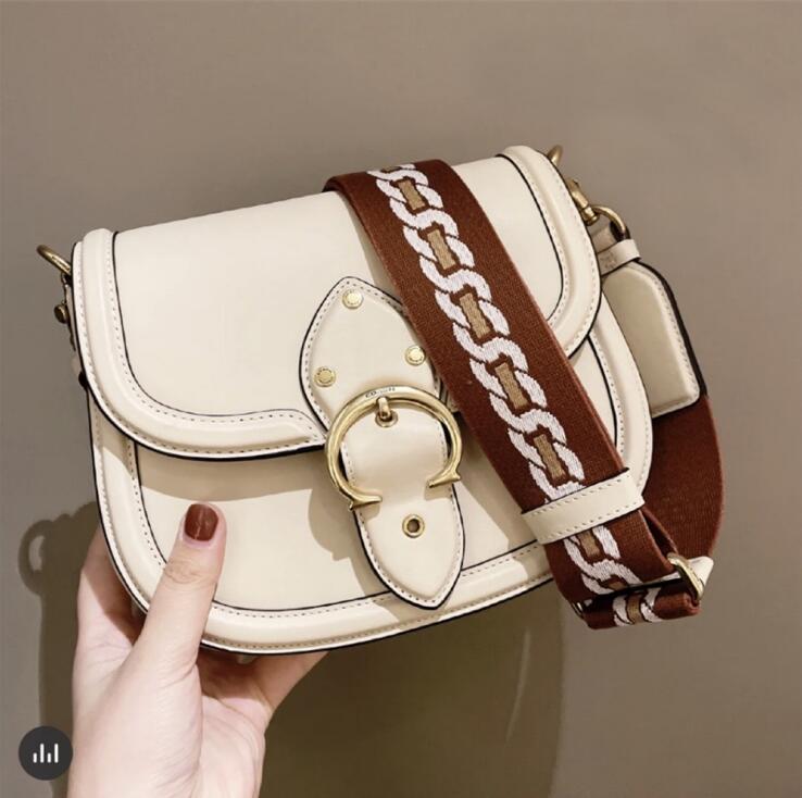 New Beat Saddle cowhide saddle bag ethnic style wide shoulder strap one-shoulder diagonal bag genuine leather handbag, Haze blue 
New Beat Saddle cowhide saddle bag ethnic style wide shoulder strap one-shoulder diagonal bag genuine leather handbag, Haze blue