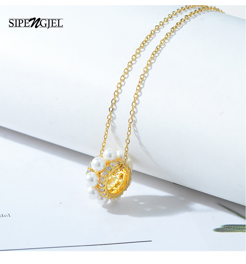 SIPENGJEL Fashion Cubic Zircon Pearl Neckalace Gold Small Round Pendnat Neckalce For Women Jewelry 2021
SIPENGJEL Fashion Cubic Zircon Pearl Neckalace Gold Small Round Pendnat Neckalce For Women Jewelry 2021