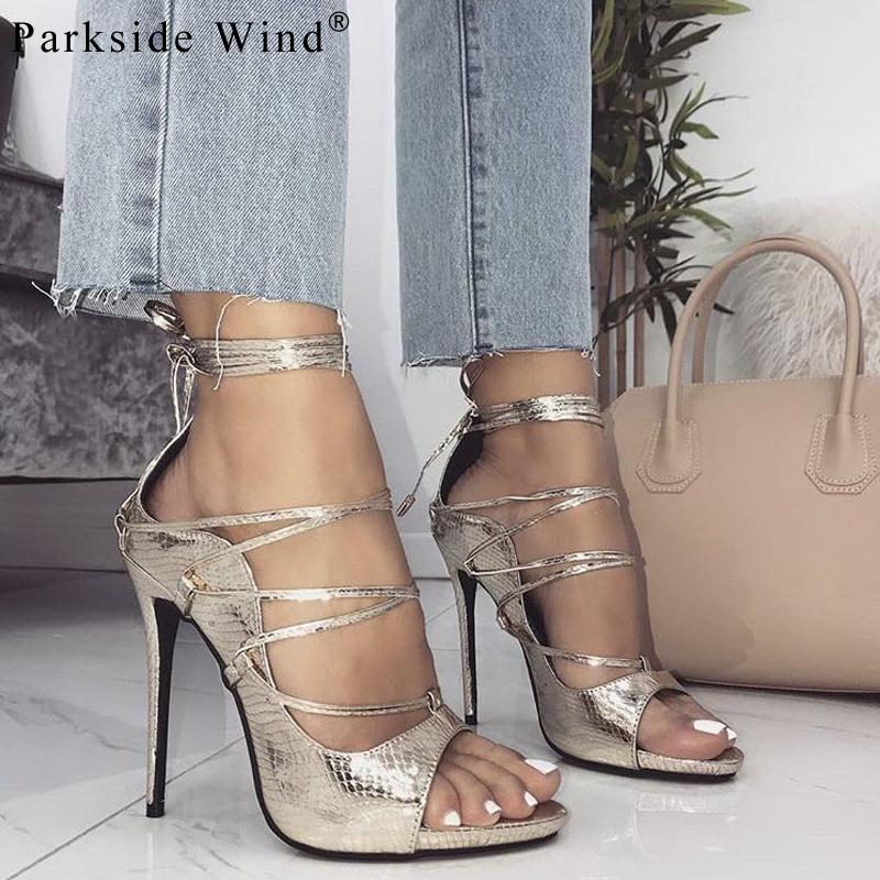 Parkside Wind Patent Leather Women Sandals Gold Cross Tied Thin High Heels Summer Fashion Party Ladies Shoes XWC2124-50, Black
Parkside Wind Patent Leather Women Sandals Gold Cross Tied Thin High Heels Summer Fashion Party Ladies Shoes XWC2124-50, Black