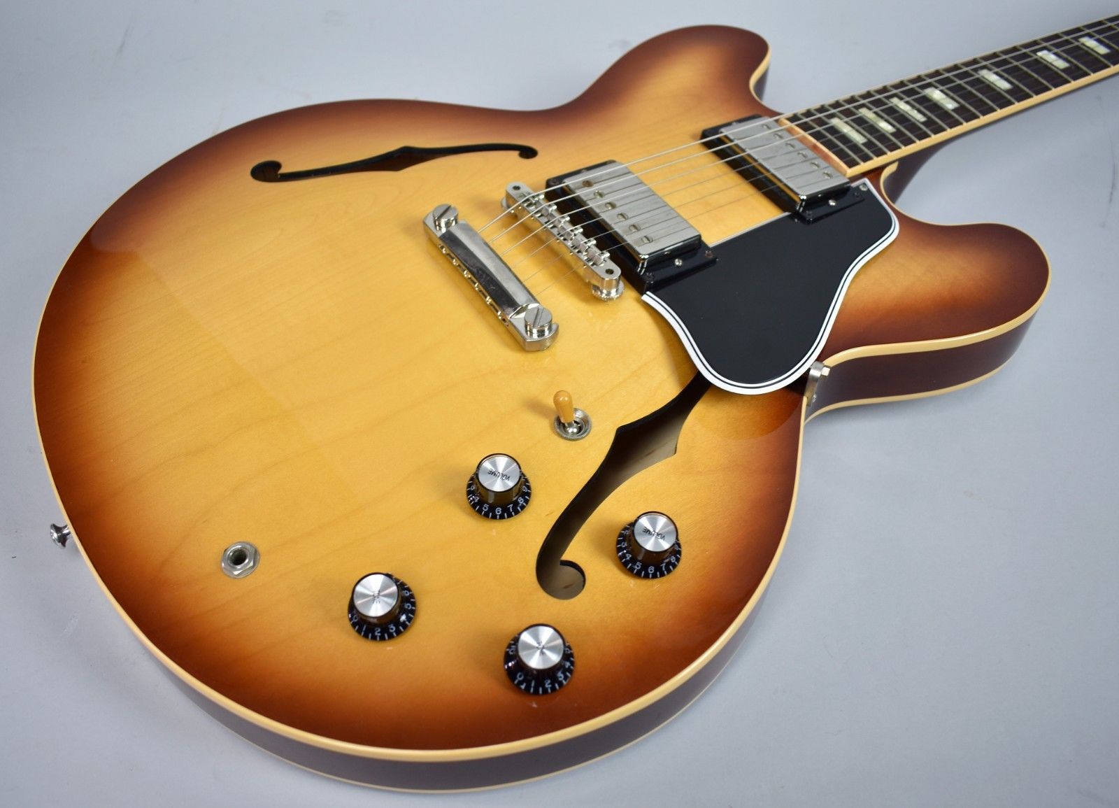 Custom Shop 335 Iced Tea Burst Semi Hollow Body Jazz Electric Guitar Double F Holes, Rosewood Fingerboard & White MOP Block Inlay
Custom Shop 335 Iced Tea Burst Semi Hollow Body Jazz Electric Guitar Double F Holes, Rosewood Fingerboard & White MOP Block Inlay