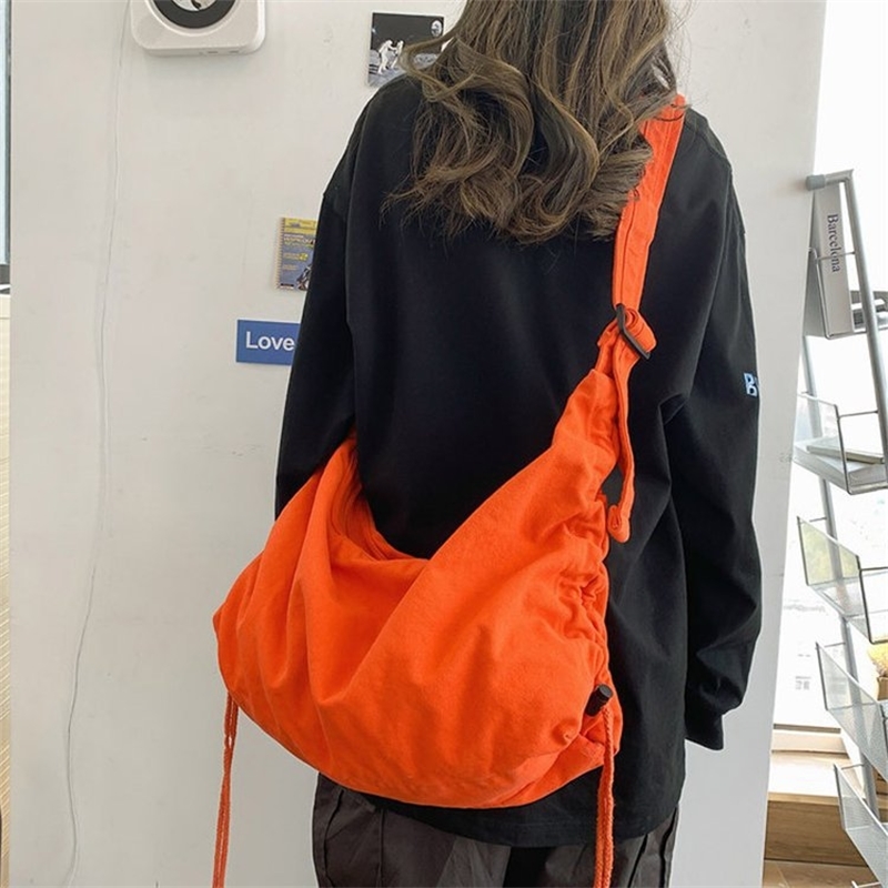 Messenger canvas female chic large capacity versatile student single shoulder ins diagonal span dumpling bag, White
Messenger canvas female chic large capacity versatile student single shoulder ins diagonal span dumpling bag, White