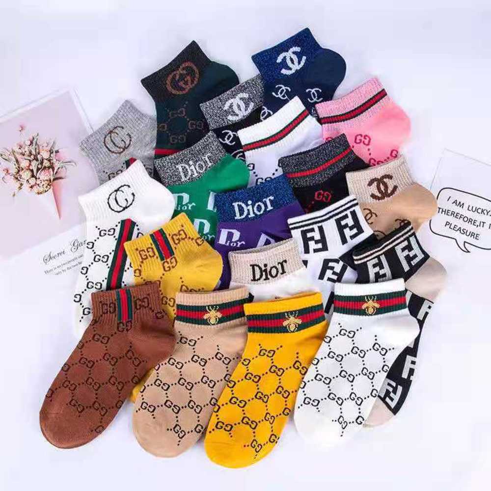 Four seasons new pure cotton Korean Chao brand gold and silver silk letter short tube women's ship socks, Black
Four seasons new pure cotton Korean Chao brand gold and silver silk letter short tube women's ship socks, Black