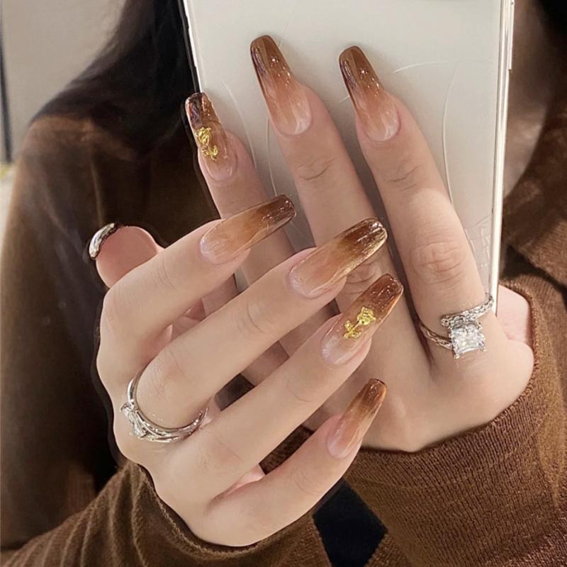 False Nails 2021 24PCS Gold Rose Fake Long Pointed Head Wearable Gradient Brown Finished Nail Piece With Glue, Red;gold
False Nails 2021 24PCS Gold Rose Fake Long Pointed Head Wearable Gradient Brown Finished Nail Piece With Glue, Red;gold