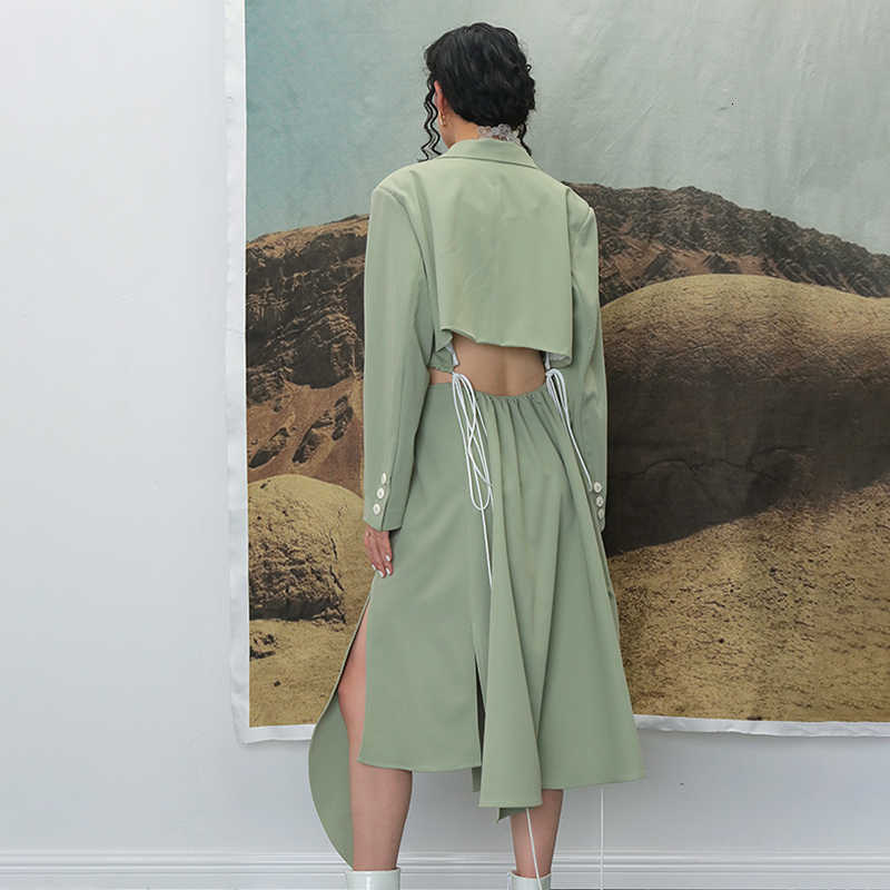 TWOTWINSTYLE Irregular Split Windbreaker For Female Lapel Collar Long Sleeve High Waist Hollow Out Drawstring Trench Coats Women 210820