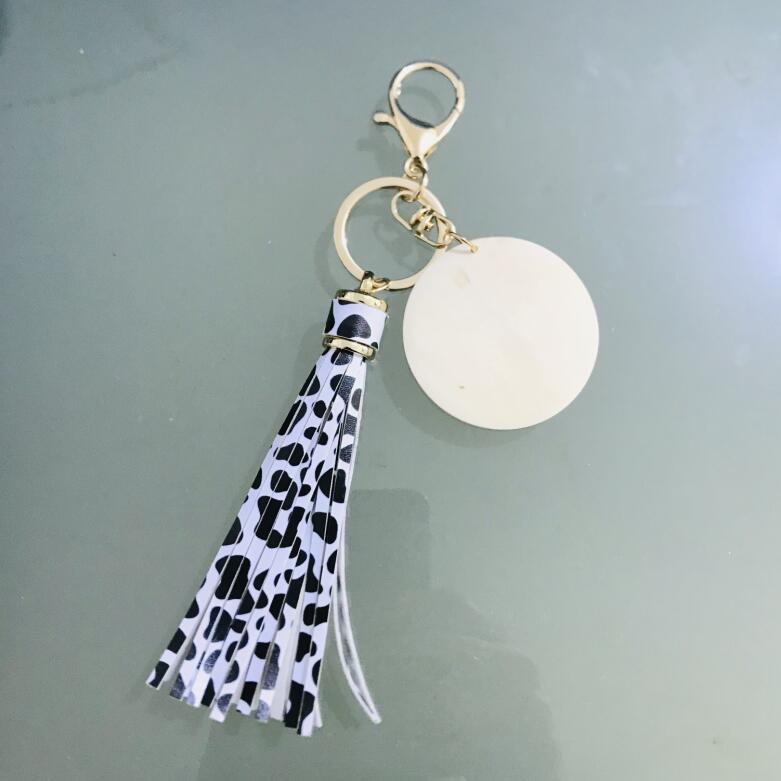 2022 The factory wholesale Monogram Personalized blank PU leather tassel wood key chain tassle key chain for women high quality tassles bags
2022 The factory wholesale Monogram Personalized blank PU leather tassel wood key chain tassle key chain for women high quality tassles bags