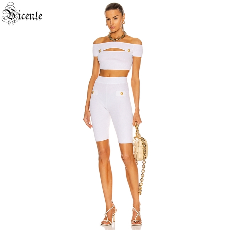 Women's Two-piece Suit Celebrity Party Button Decoration Hollow Design Neck Strapless White Bandage 210520
Women's Two-piece Suit Celebrity Party Button Decoration Hollow Design Neck Strapless White Bandage 210520