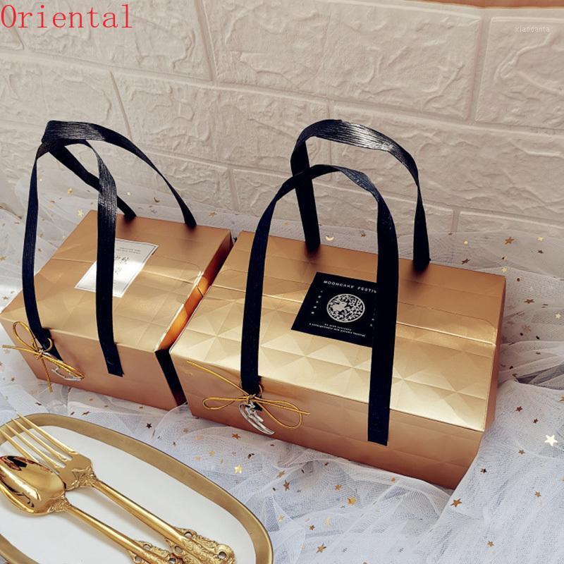 Baby Shower Birthday Party Supplies Golden Gift Box Packaging Year 2021 Hand-held Boxes Cajas De Carton Moon Cake Wrap
Baby Shower Birthday Party Supplies Golden Gift Box Packaging Year 2021 Hand-held Boxes Cajas De Carton Moon Cake Wrap
