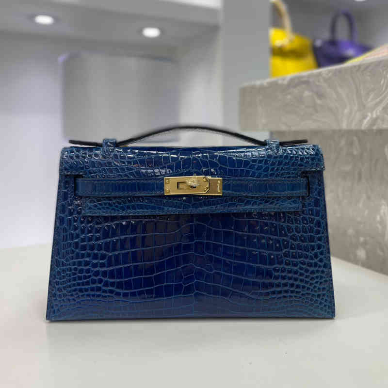 With Box Mini Kellys Generation High Gloss Belly Dark Blue Real Crocodile Bag Hand Sewn Wax Thread Gold Buckle Color Matching
With Box Mini Kellys Generation High Gloss Belly Dark Blue Real Crocodile Bag Hand Sewn Wax Thread Gold Buckle Color Matching