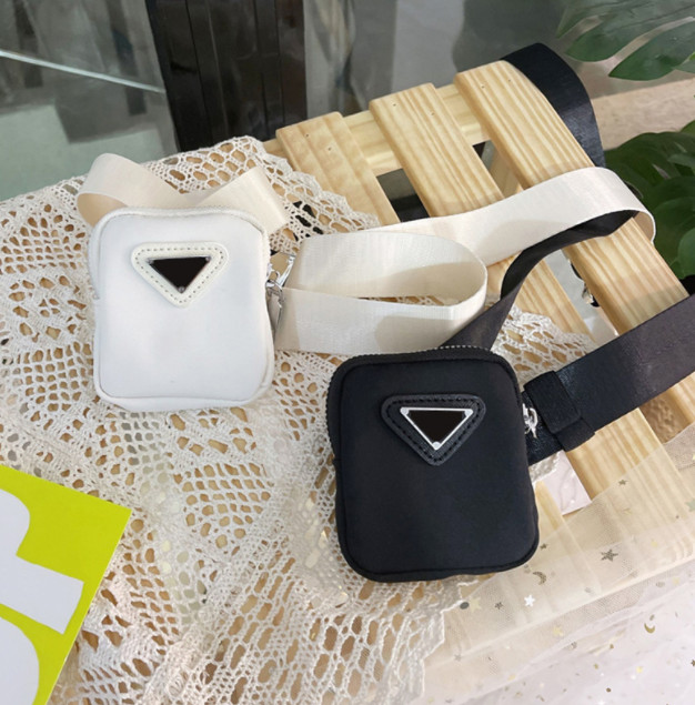 Luxury Children purse girls nylon waist bags wallet designer kids triangle messenger bag boys bust bags A8124, Black
Luxury Children purse girls nylon waist bags wallet designer kids triangle messenger bag boys bust bags A8124, Black