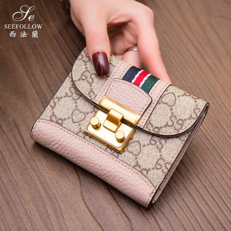wallet women's cowhide short leather folding simple three fold multi card small fashion, Red;black
wallet women's cowhide short leather folding simple three fold multi card small fashion, Red;black