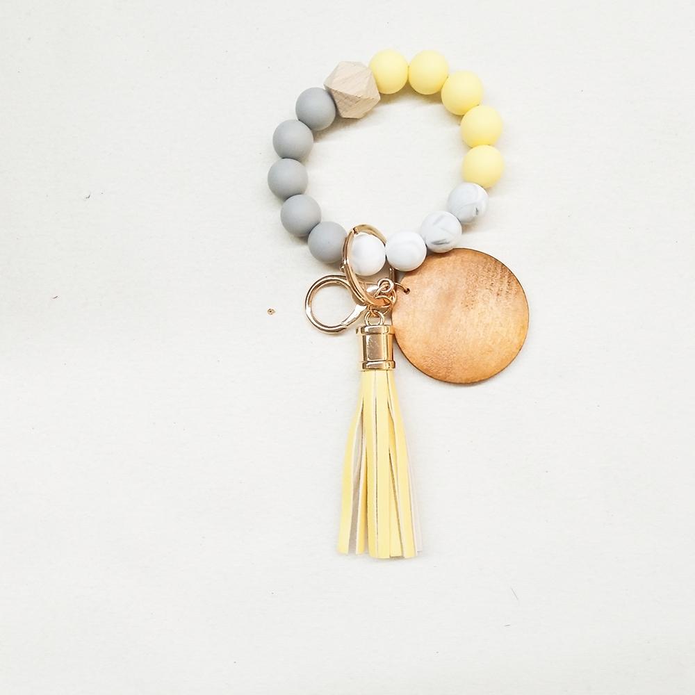Foreign trade food grade silicone beads wrist keychain PU leather tassel key ring female multi-color optional