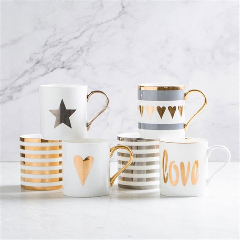 Mugs Luxury Gold Ceramic Coffee Mug With Handle Cute Breakfast Milk Tea Cup Star Stripe Pattern Water Drinkware Creative Gift, Gold stripes
Mugs Luxury Gold Ceramic Coffee Mug With Handle Cute Breakfast Milk Tea Cup Star Stripe Pattern Water Drinkware Creative Gift, Gold stripes