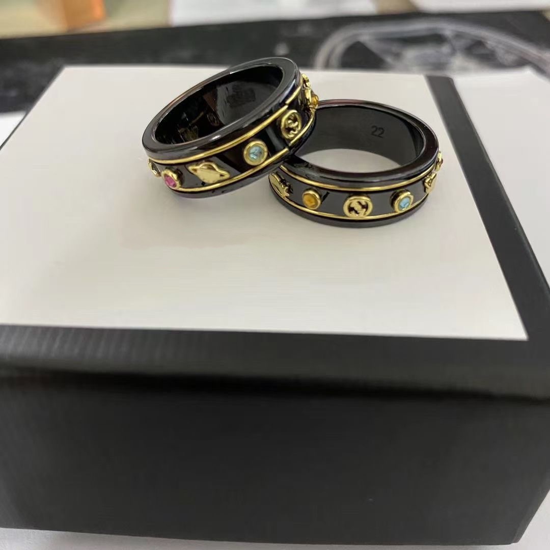 Gujia double G ceramic black and white letter bee planet classic couple ring, Golden;silver
Gujia double G ceramic black and white letter bee planet classic couple ring, Golden;silver
