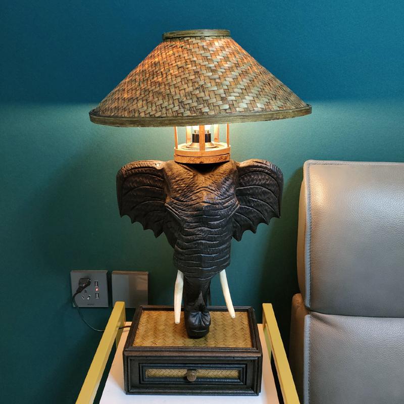 Thailand Elephant Head Table Lamp Southeast Asia Wood Carving Desk Bedroom Bamboo Hand-woven Decoration Lights Lamps
Thailand Elephant Head Table Lamp Southeast Asia Wood Carving Desk Bedroom Bamboo Hand-woven Decoration Lights Lamps