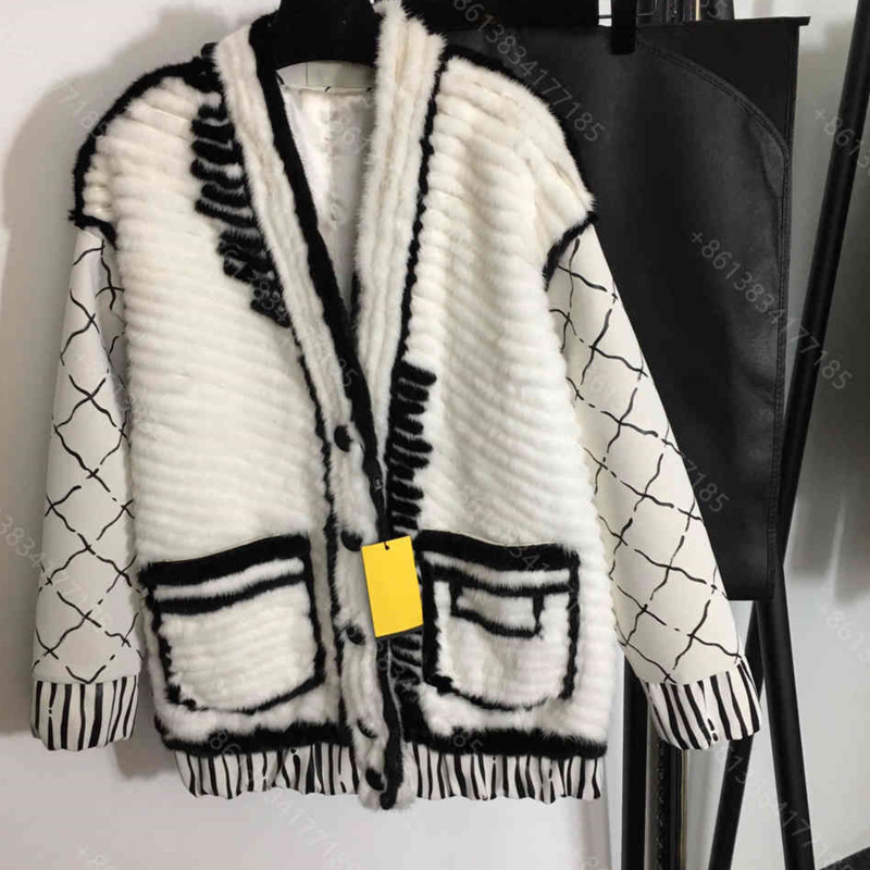 Fashion women jacket coat high-end mink fur coats with dust bag logo brand winter long sleeve womens designer clothes SML a1
Fashion women jacket coat high-end mink fur coats with dust bag logo brand winter long sleeve womens designer clothes SML a1