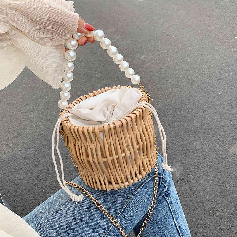NEW Pearl bag women's new hand-woven straw bag rattan crossbody shoulder bags ins wild evening clutch bags C0326
NEW Pearl bag women's new hand-woven straw bag rattan crossbody shoulder bags ins wild evening clutch bags C0326