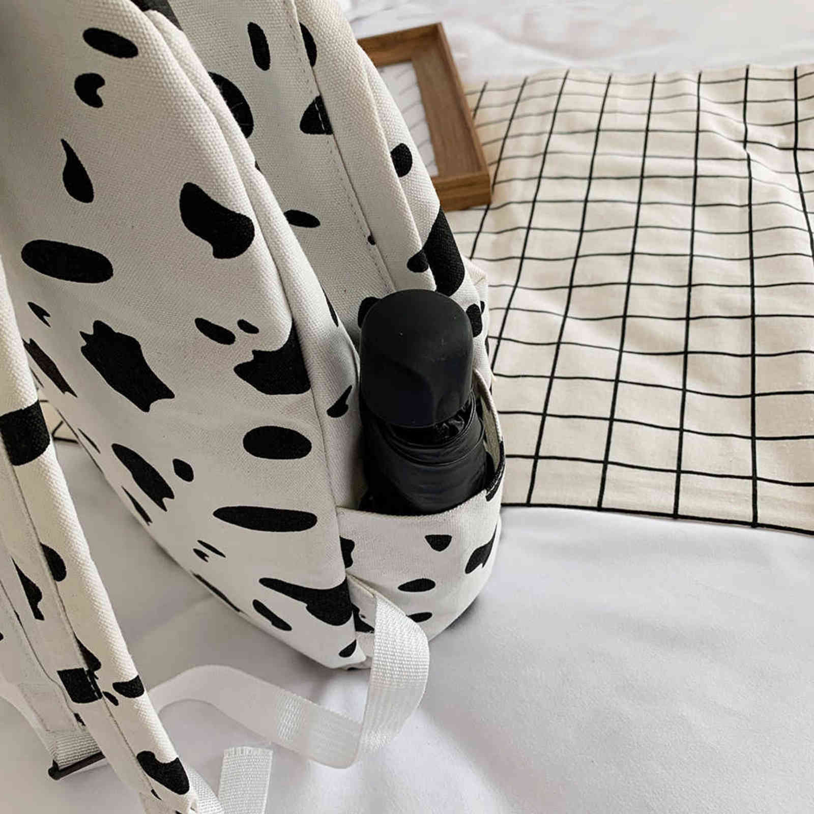 Cow Milk Print Canvas Backpack Women Students Girls Daily Casual Bag Large Capacity Shoulder School Bag 2021 Fashion Popular Y1105