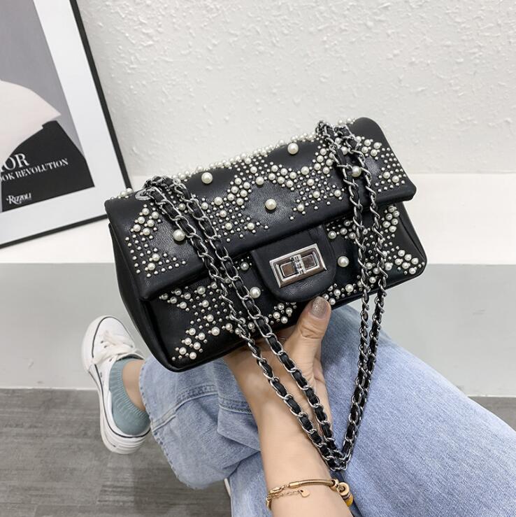 Factory wholesale leather messenger bags sweet little fresh diamond chain bag street personality rivet handbags Pearl beaded women fashion handbag
Factory wholesale leather messenger bags sweet little fresh diamond chain bag street personality rivet handbags Pearl beaded women fashion handbag
