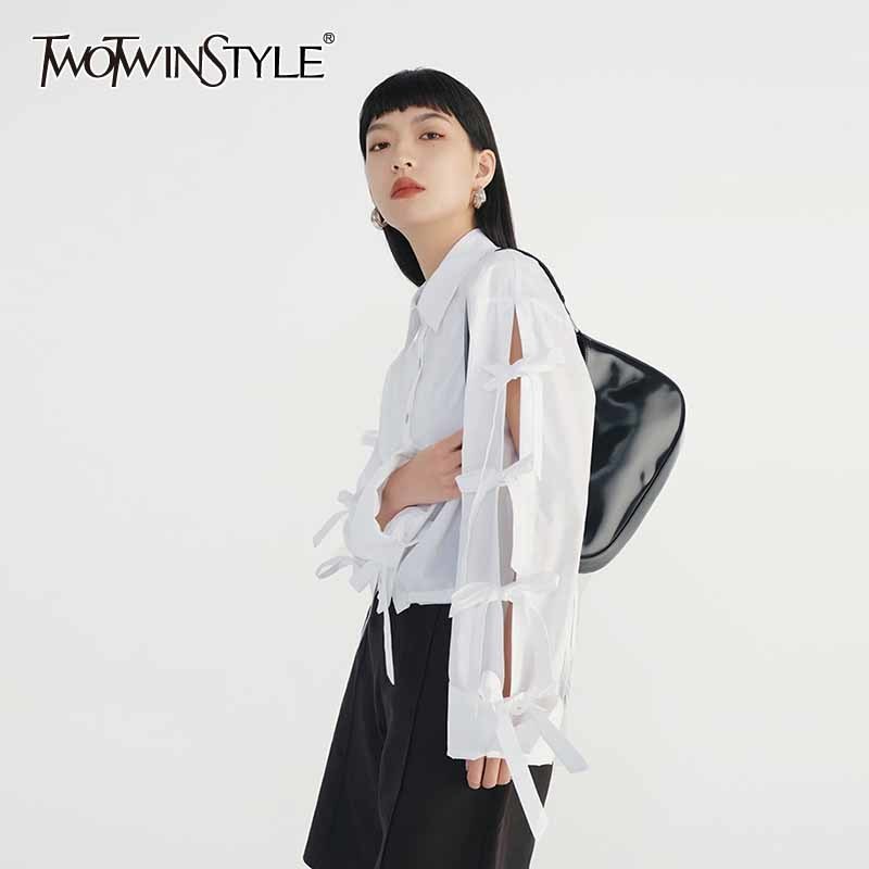 White Hollow Out Casual Shirts For Women Lapel Long Sleeve Bowknot Single Breasted Solid Blouses Female Summer 210524
White Hollow Out Casual Shirts For Women Lapel Long Sleeve Bowknot Single Breasted Solid Blouses Female Summer 210524