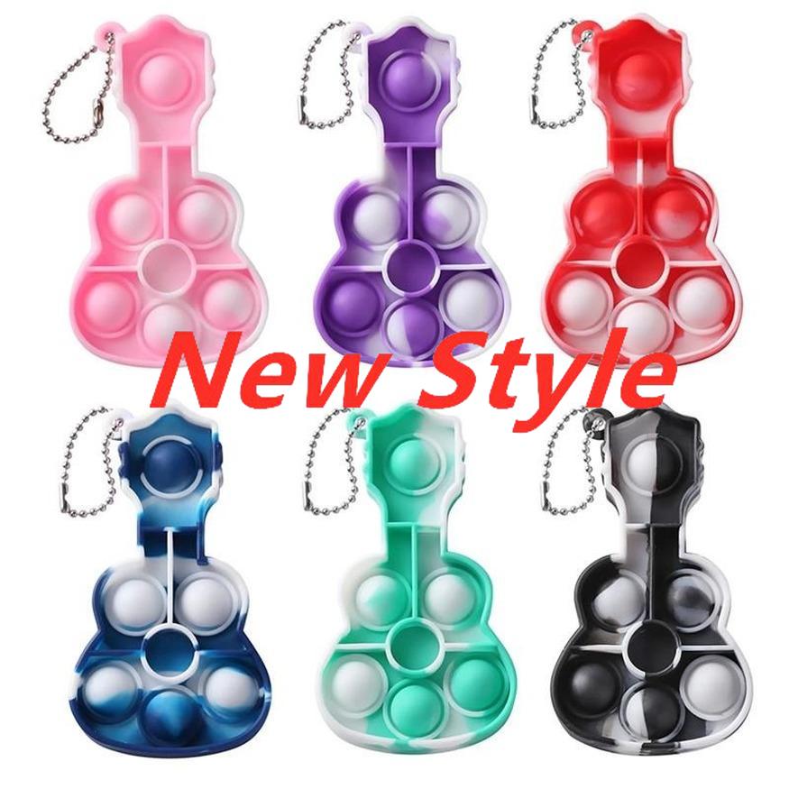 Mini Fidget Toys Push Bubble Guitar Keychain Toy Sensory Anti-Anxiety Silicone Squeeze Stress Relief Gifts for Kids and Adults
Mini Fidget Toys Push Bubble Guitar Keychain Toy Sensory Anti-Anxiety Silicone Squeeze Stress Relief Gifts for Kids and Adults