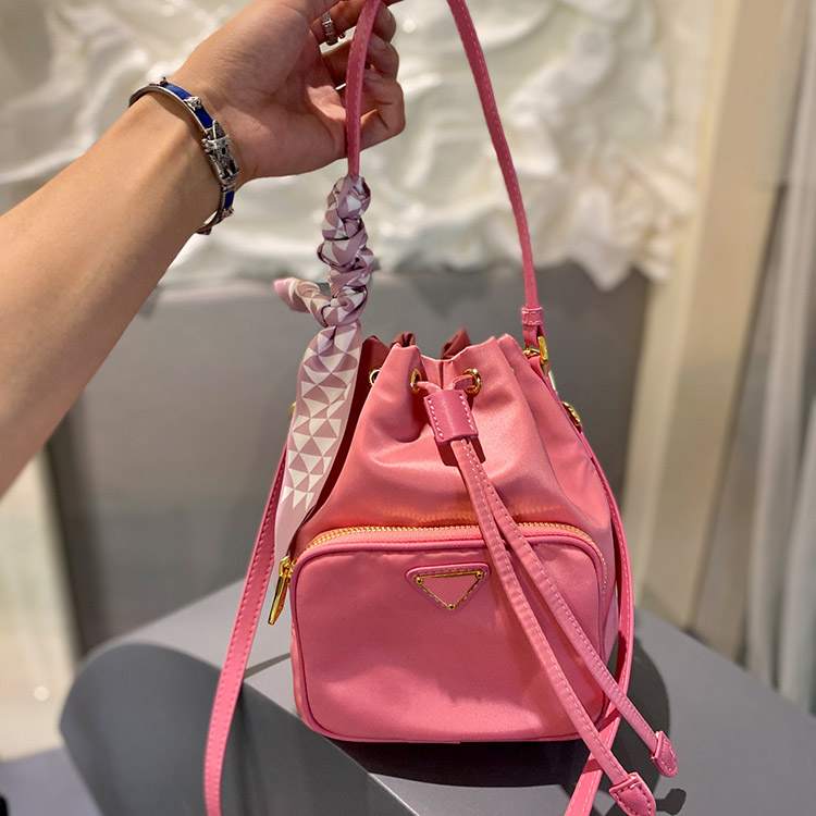 Designer Nylon bucket bag ladies small handbag women shoulder crossbody bags with Ribbon size 20cm, Pink
Designer Nylon bucket bag ladies small handbag women shoulder crossbody bags with Ribbon size 20cm, Pink